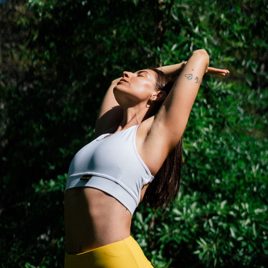 Girl in a peaceful pose, promoting gut health and overall well-being through yoga practice.